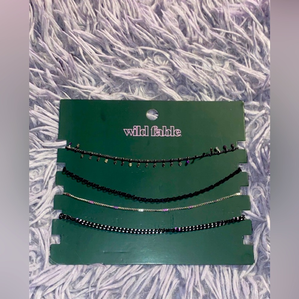 4 dark Necklaces. Bought for prom but only wore one of them.